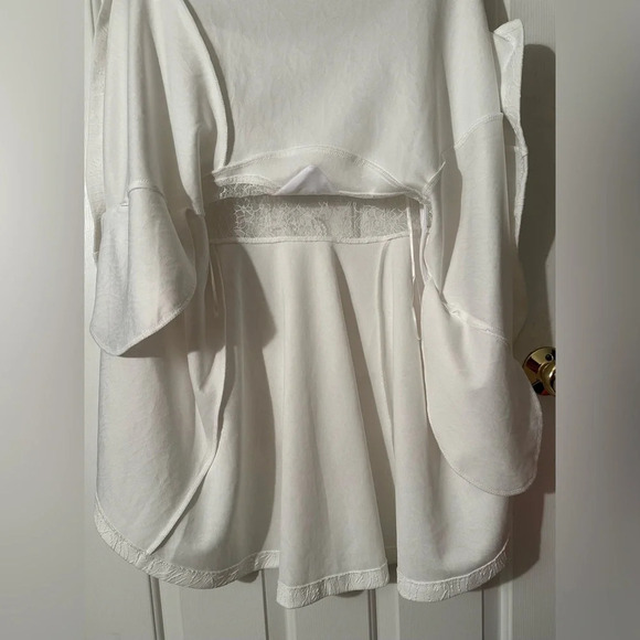 NWOT Free People ALLURING Brooklyn Mini Dress White L Lace Sheer Twirly Pockets - Picture 8 of 16
